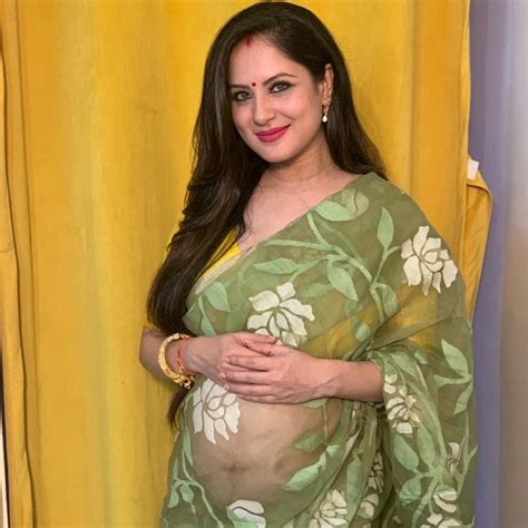 puja banerjee hot|Pooja Banerjee beams with joy as she flaunts her baby bump at her bab.